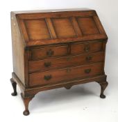 A 20th century oak bureau.