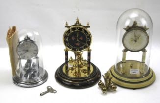 Three contemporary anniversary clocks.