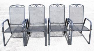 A set of four contemporary metal garden chairs.