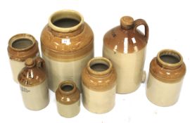 An assortment of stoneware storage vessels.