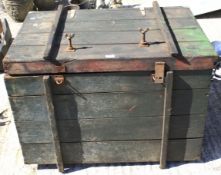 A large early 20th century painted wooden storage trunk.