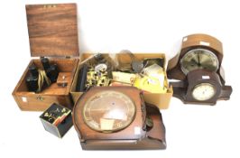 Three clocks and an assortment of collectables.
