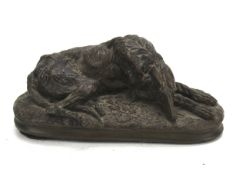 After Paul Joseph Raymond Gayrard (1807-1855), bronzed figure of a recumbent borzoi or deerhound.