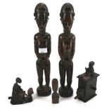 An assortment of carved wooden figures.