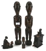 An assortment of carved wooden figures.