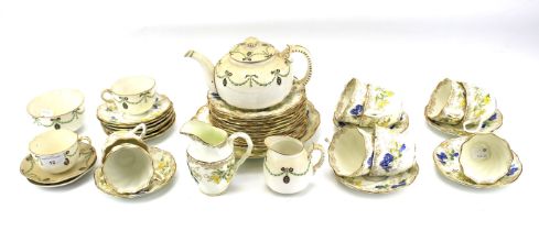 A Staffordshire porcelain part tea service and a Royal Worcester part tea service.