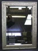 A 20th century bevelled edge wall mirror.
