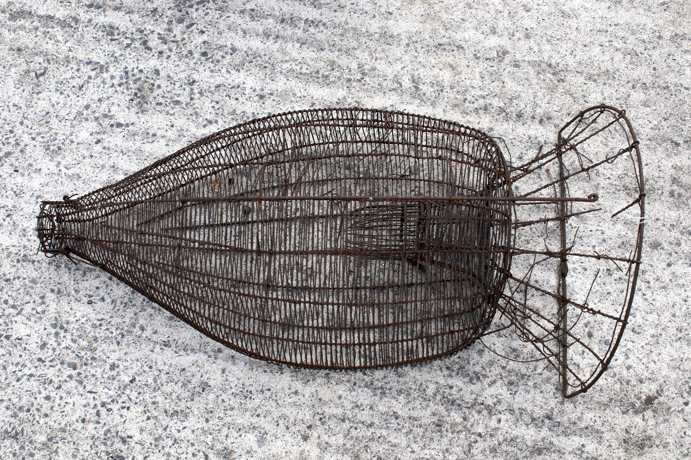 A vintage metal fish/eel trap.