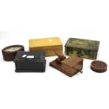 An assortment of wooden and metal boxes.