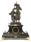 A late 19th century slate mantel clock with finial.