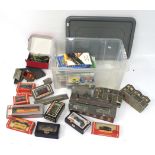 An assortment of OO gauge freight stock and accessories.