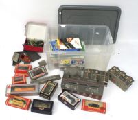 An assortment of OO gauge freight stock and accessories.