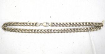 A white metal curb link chain.