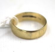 A 9ct gold wedding band. Weight 5.