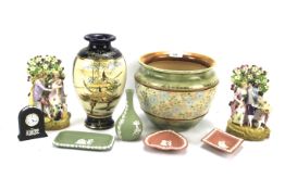 An assortment of ceramics, including a Royal Doulton planter, a selection of Wedgwood,