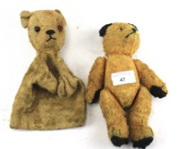 A 1950s Sooty teddy bear and a teddy puppet.