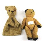 A 1950s Sooty teddy bear and a teddy puppet.