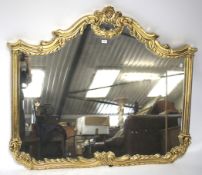 A 20th century gilt framed overmantel wall mirror.