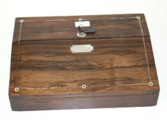 A Victorian rosewood writing slope.