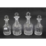 A set of four Georgian ring neck cut glass decanters.