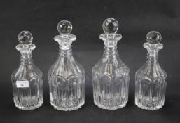 A set of four Georgian ring neck cut glass decanters.
