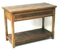 A contemporary carved oak hall table.