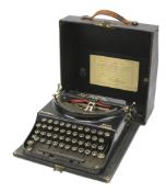 A vintage Remington Home Portable typewriter.