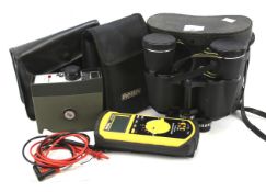 A Robin AR6004 digital multimeter, a pair of Miranda 7x50 binoculars and an 8mm film camera.