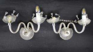A pair of 20th century etched glass two-branch light wall sconces.