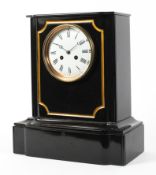 A late Victorian slate striking mantel clock.