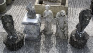 An assortment of 20th century garden stone items.