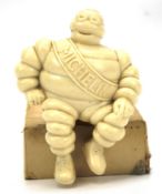 A resin model of a Michelin Man advertising figure.
