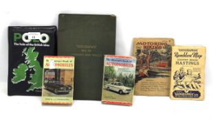 A small collection of motoring books and maps.