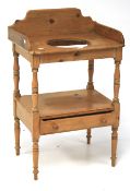 A 19th century pine wash stand.