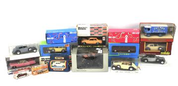 An assortment of diecast vehicles, mostly Rolls-Royce.