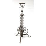 A 20th century cast metal adjustable standard lamp.