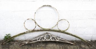 A large 20th century cast iron white painted archway and a smaller pair.