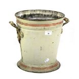 A vintage tin ice bucket, possibly French.