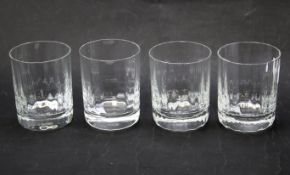 A set of four Baccarat crystal glass whisky tumblers. Etched mark to underside Baccarat France, 10.