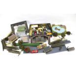 A collection of diecast vehicles and model trainline accessories.