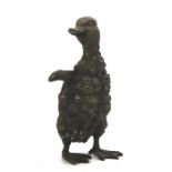 A bronze model of a 'fluffy duckling'.