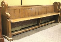 A 19th century pine church pew.