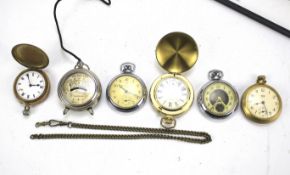 A collection of pocket watches and a voltmeter.