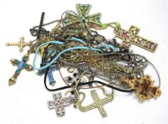 Fifteen vintage cross pendants and necklaces.