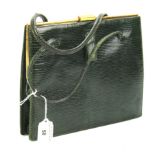 A vintage snakeskin vintage handbag.