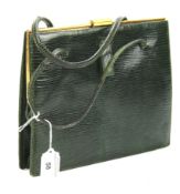 A vintage snakeskin vintage handbag.