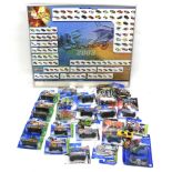 A collection of mostly boxed Hotwheels vehicles, together with a 2003 Hotwheels poster,