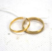 A 22ct yellow gold wedding band and a 9ct yellow gold wedding band. Weights 1.3g & 1.