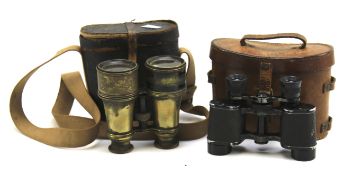 Two pairs of vintage binoculars.