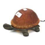 A novelty lamp in the form of a tortoise.
